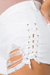 Curvy fit white destroyed denim shorts with lace up sides